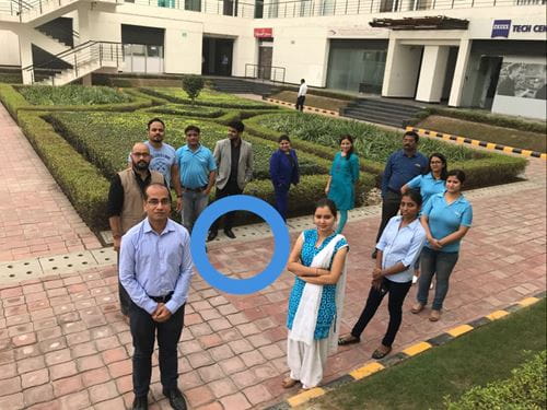 Forming a blue circle outside the office